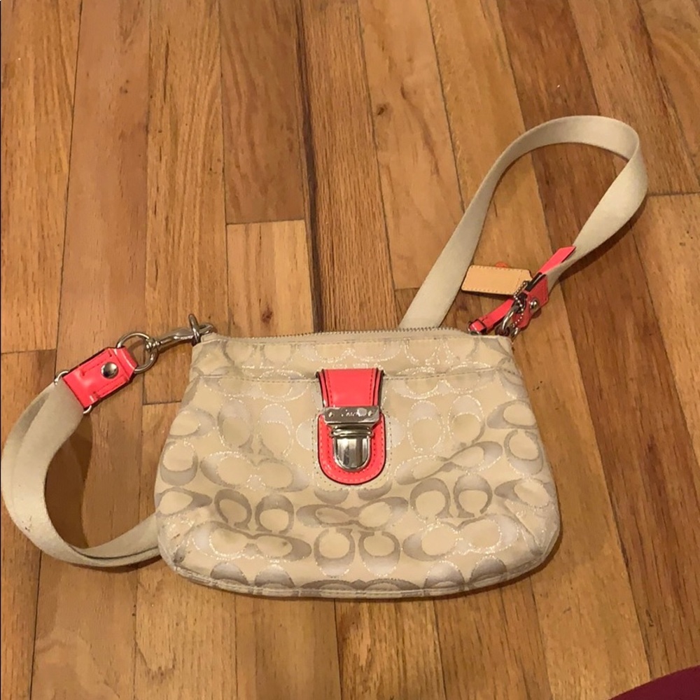 Pink and beige Coach crossbody bag